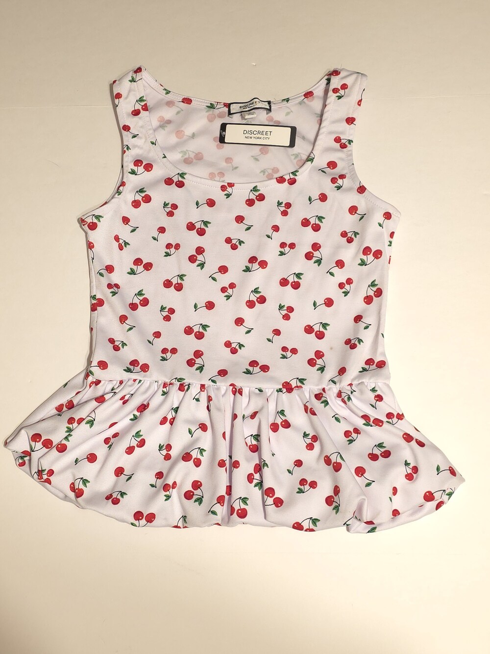 Discreet New York City Cherry Print Peplum Top